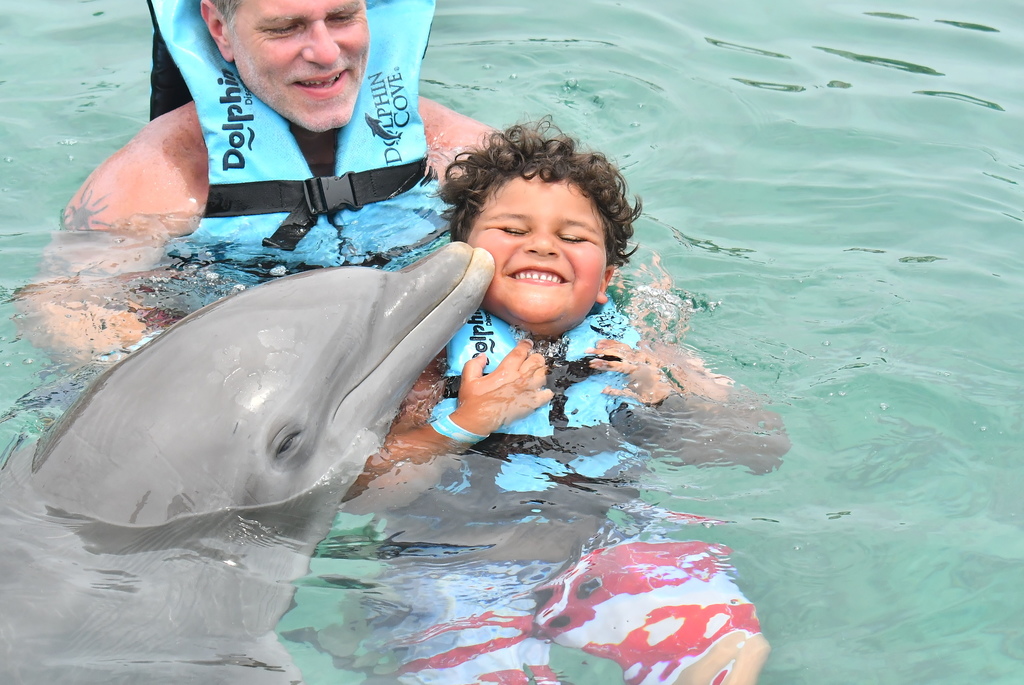 Karmelo with a dolphin