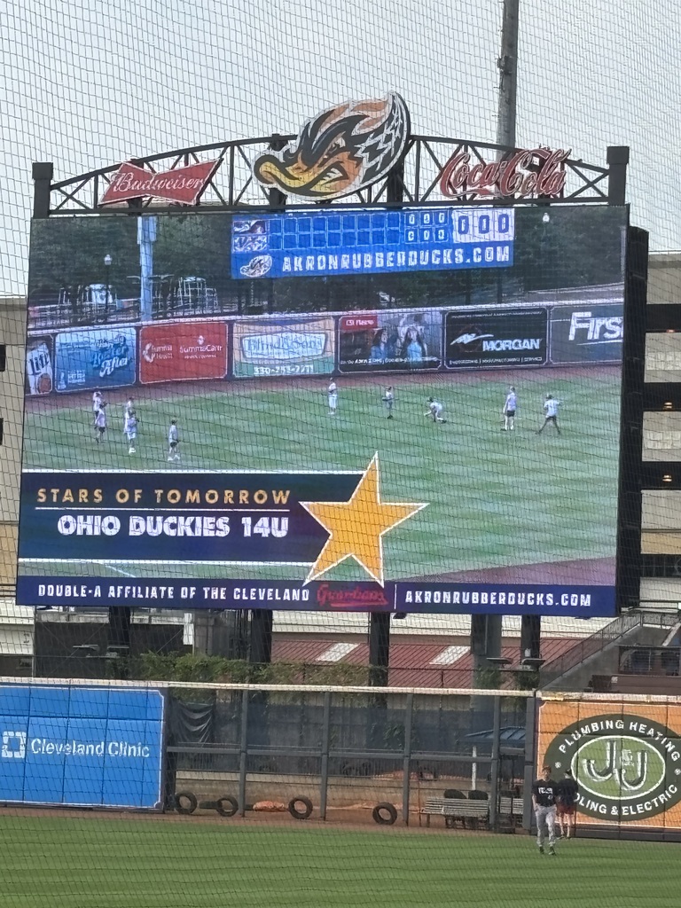 Picture of the team on the scoreboard
