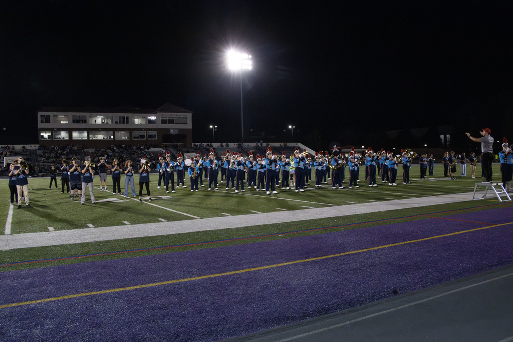 Students performing at the game