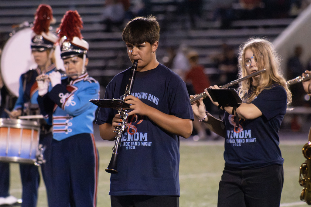 Students performing at the game