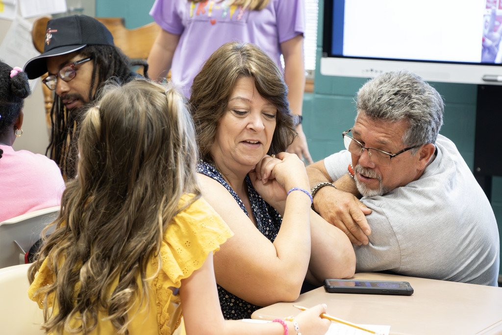 students with their grandparents