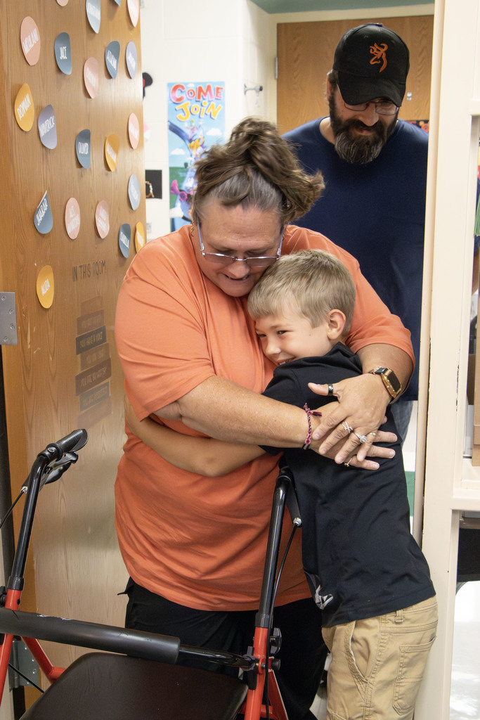 students with their grandparents