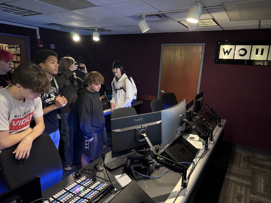 Students looking at the behind the scenes studio