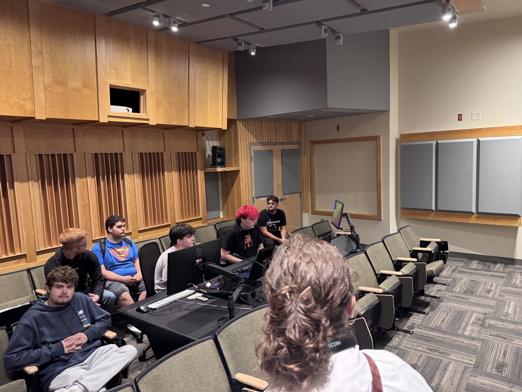 students sitting in a lecture hall 