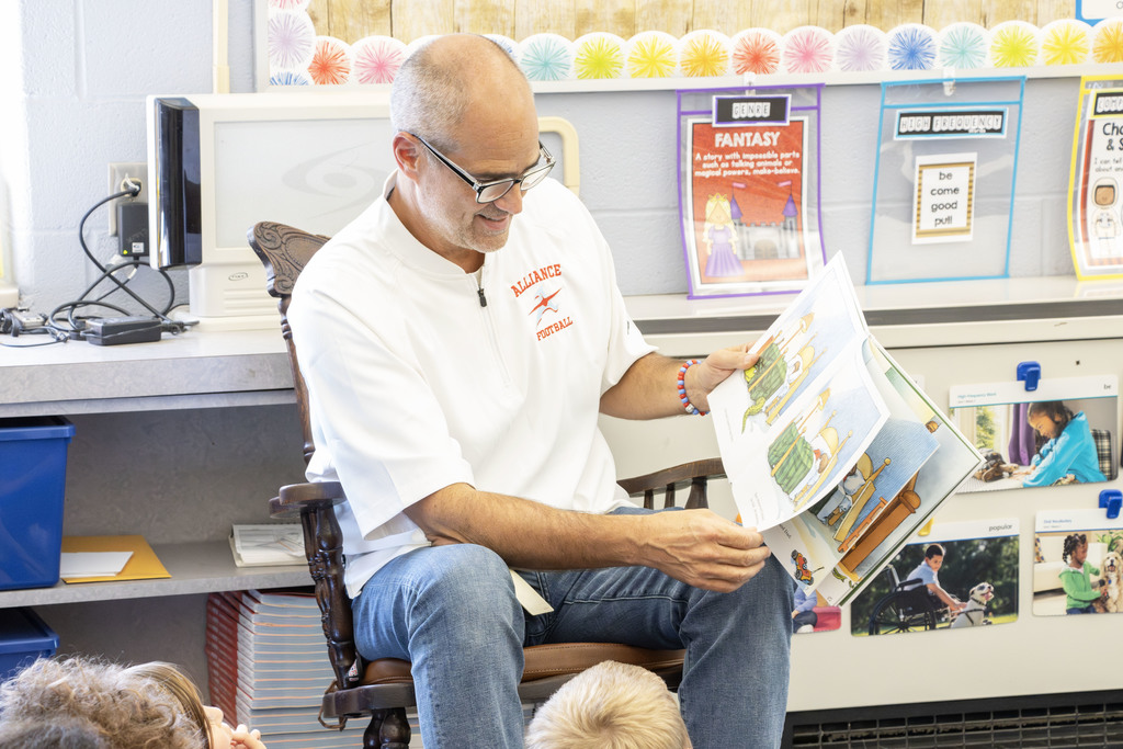 Mr. Jackson reading to students