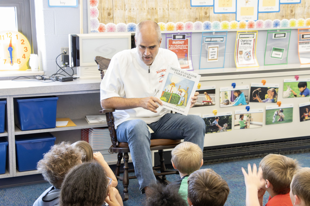 Mr. Jackson reading to students
