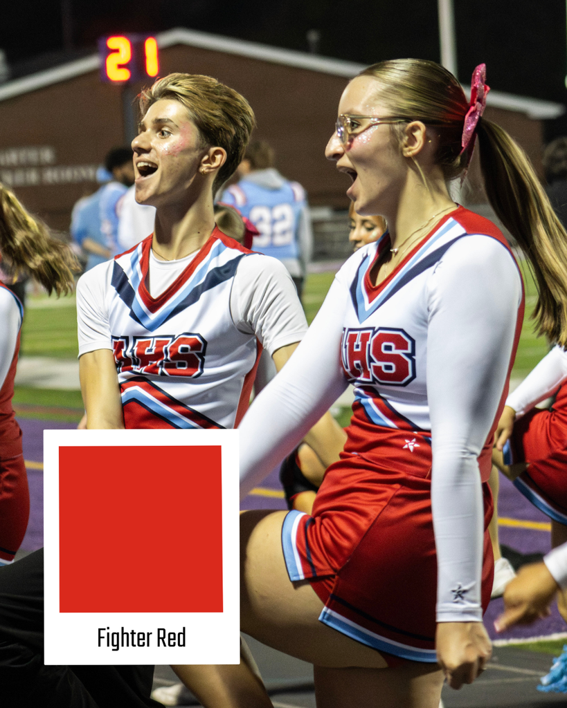 cheerleaders cheering on the sideline