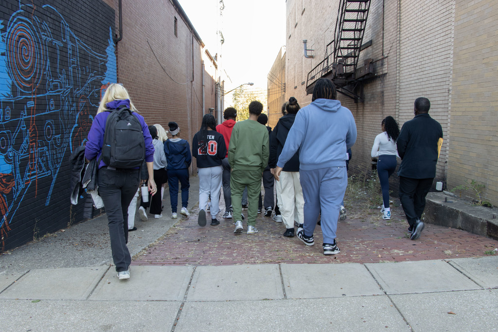 students walking down and alley