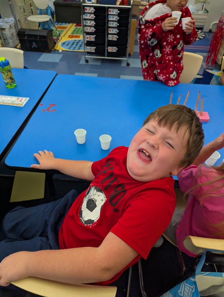 student making a funny face after tasting something sour