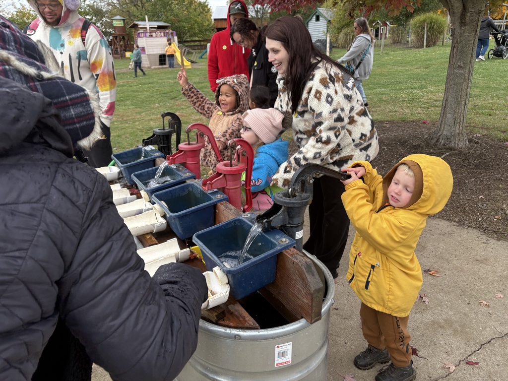 Students pumping water