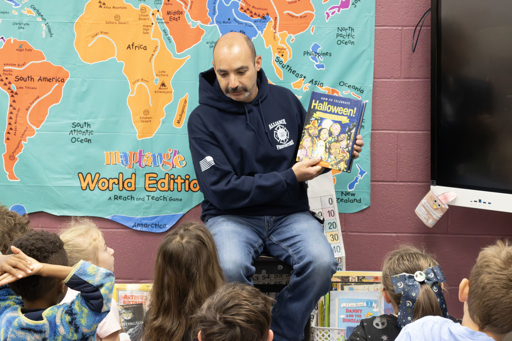 Readers in the classrooms reading to the students