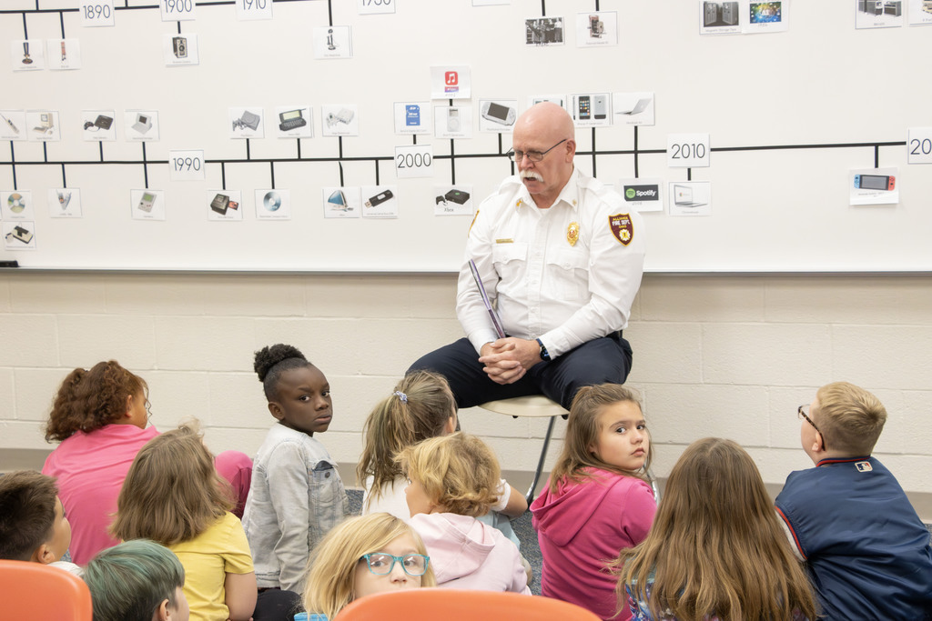 Readers in the classrooms reading to the students