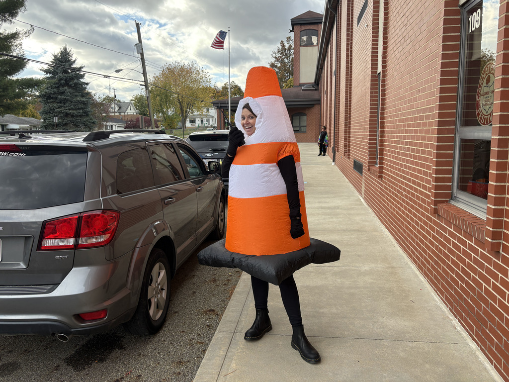 Mindy Wolford dressed as a traffic cone