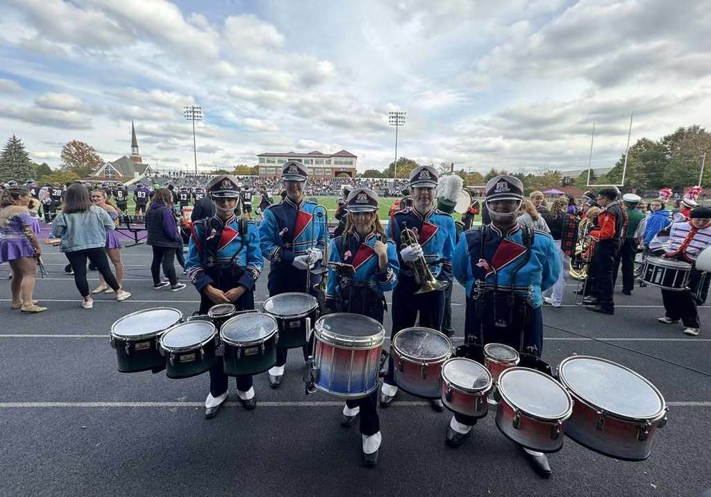 All 5 aviator band members standing together