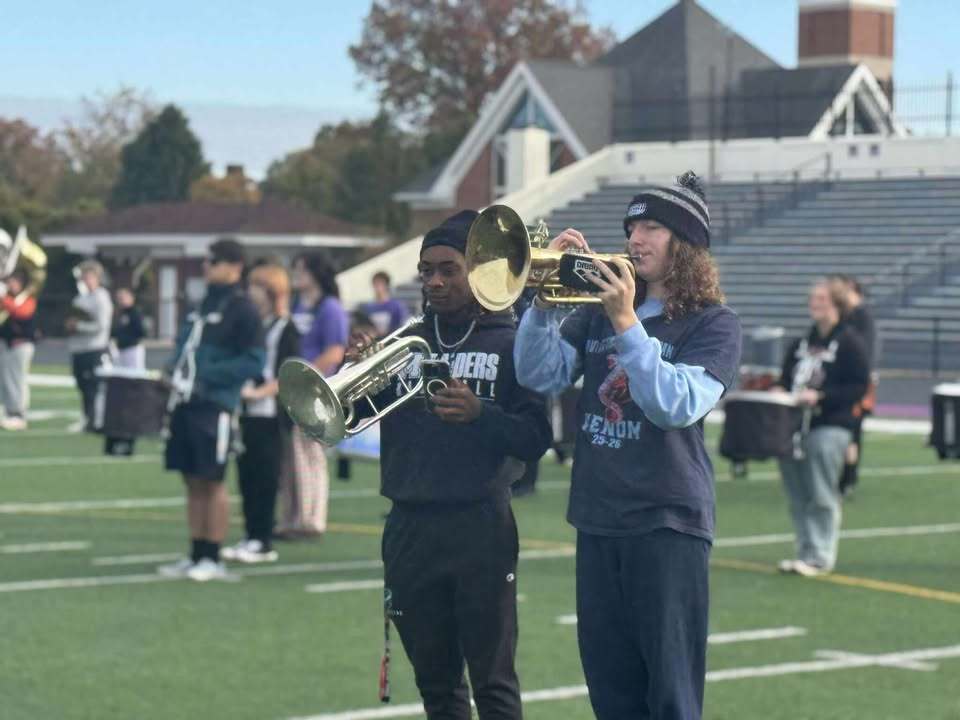 student playing the trumpet