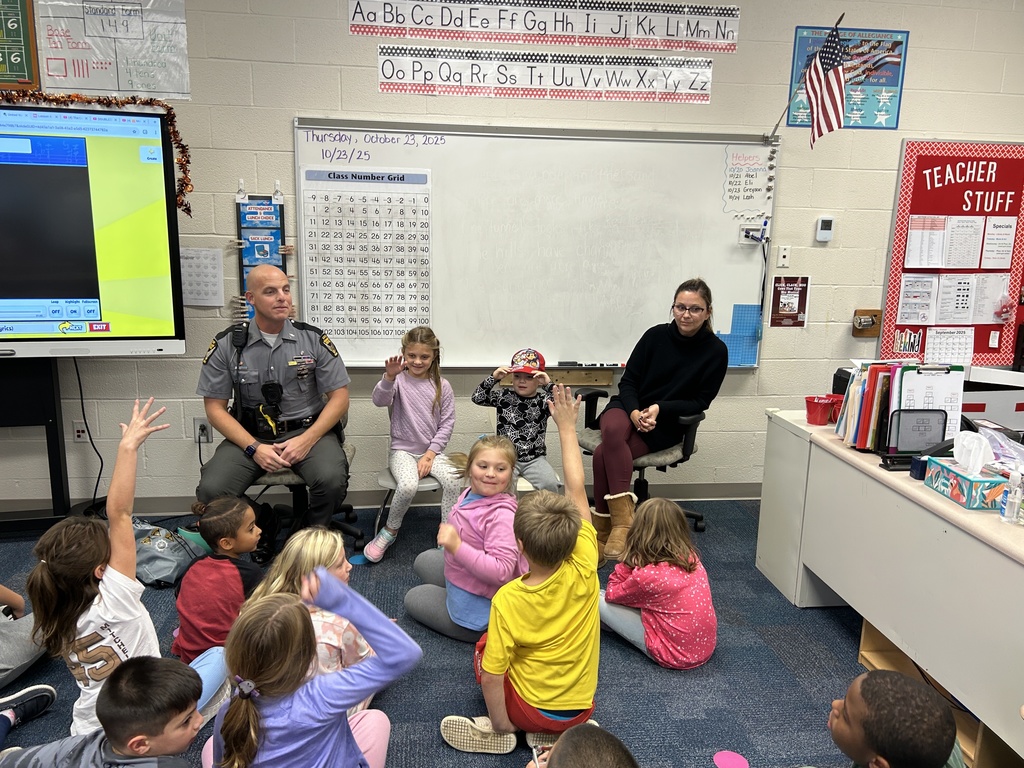 The Shonk family talking to the class