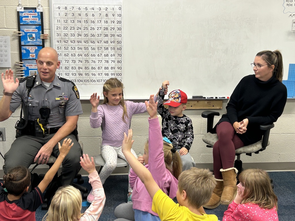The Shonk family talking to the class