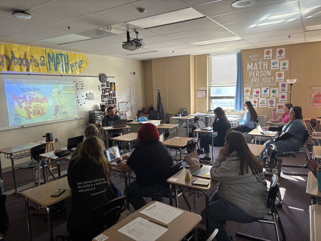 Staff listening to a presentation