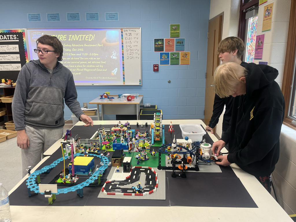 Students working on building the lego amusement park