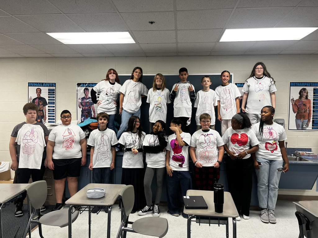 students wearing their shirts