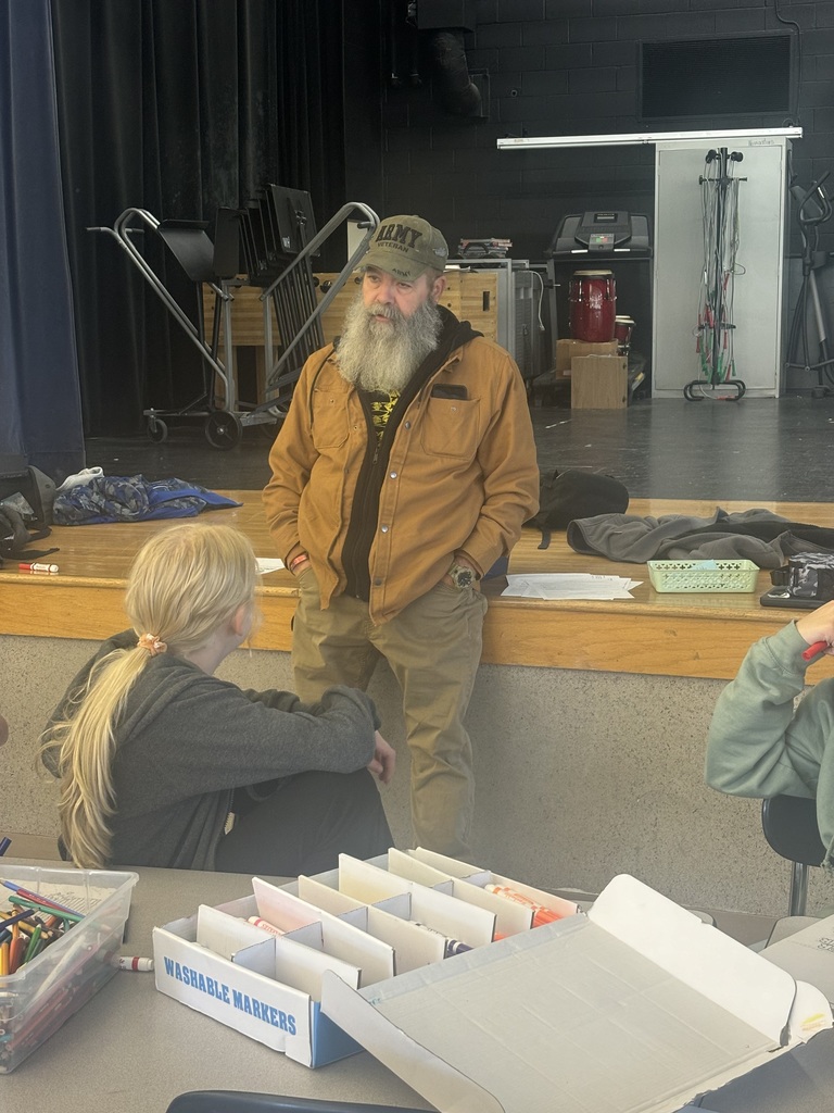 veteran speaking to the students