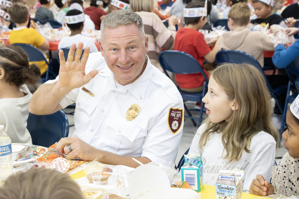 Special guests eating with the students