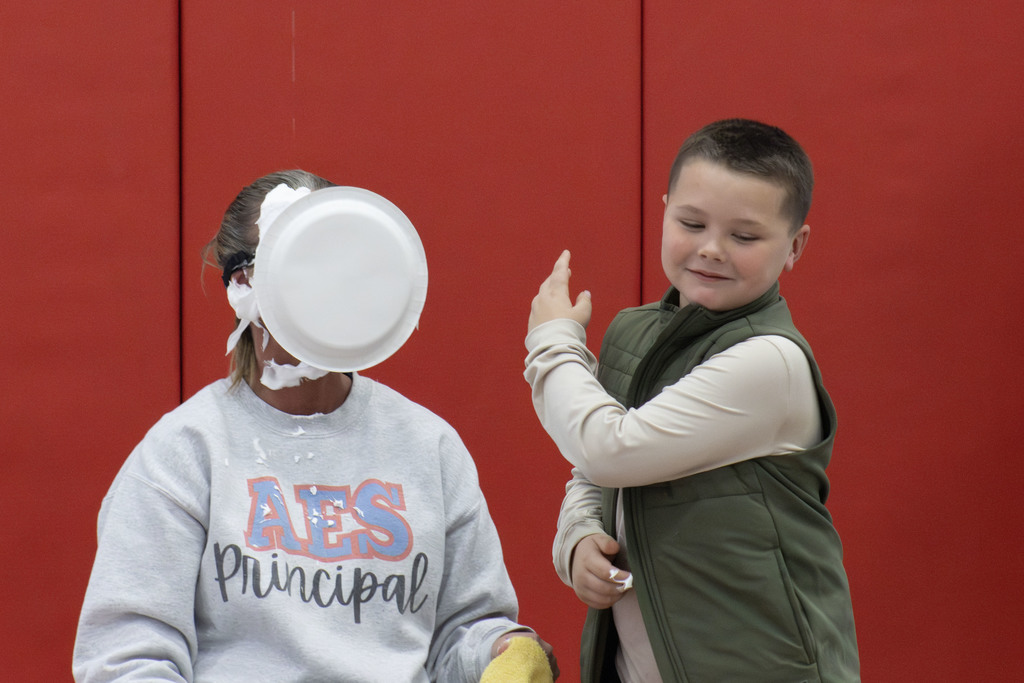 A student pieing Ms. Waller