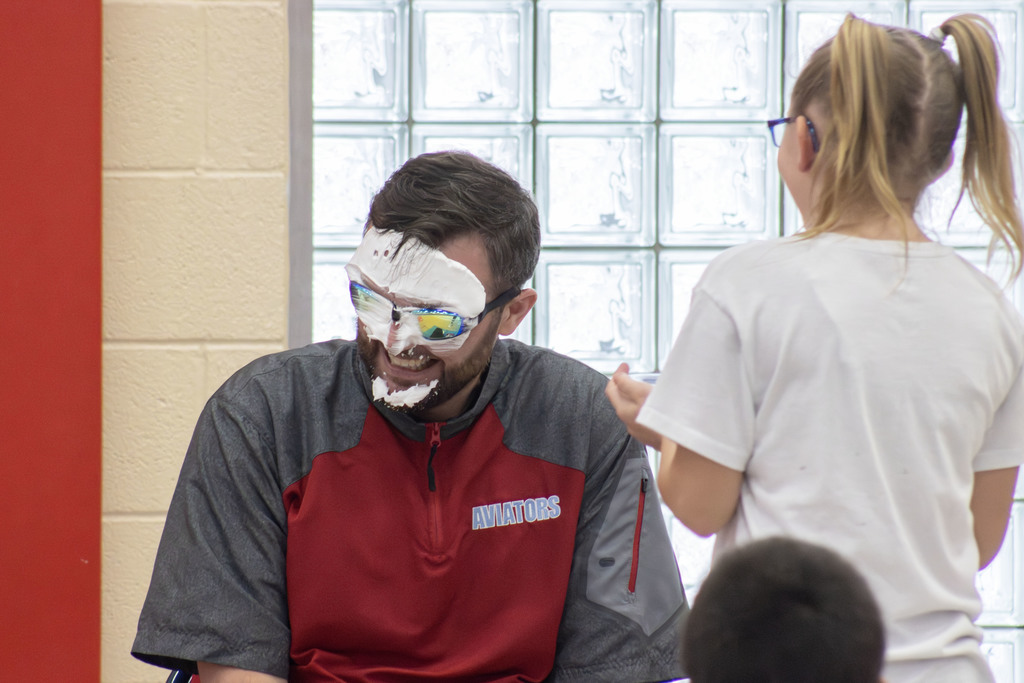 A student pieing Mr. Logothetides