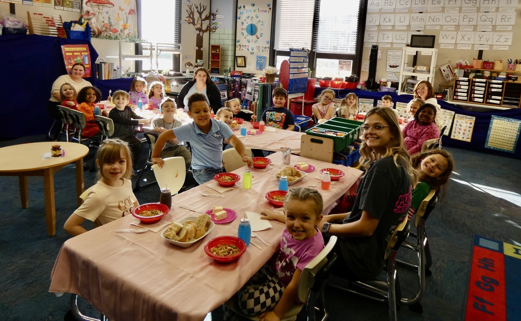 Students eating stone soup