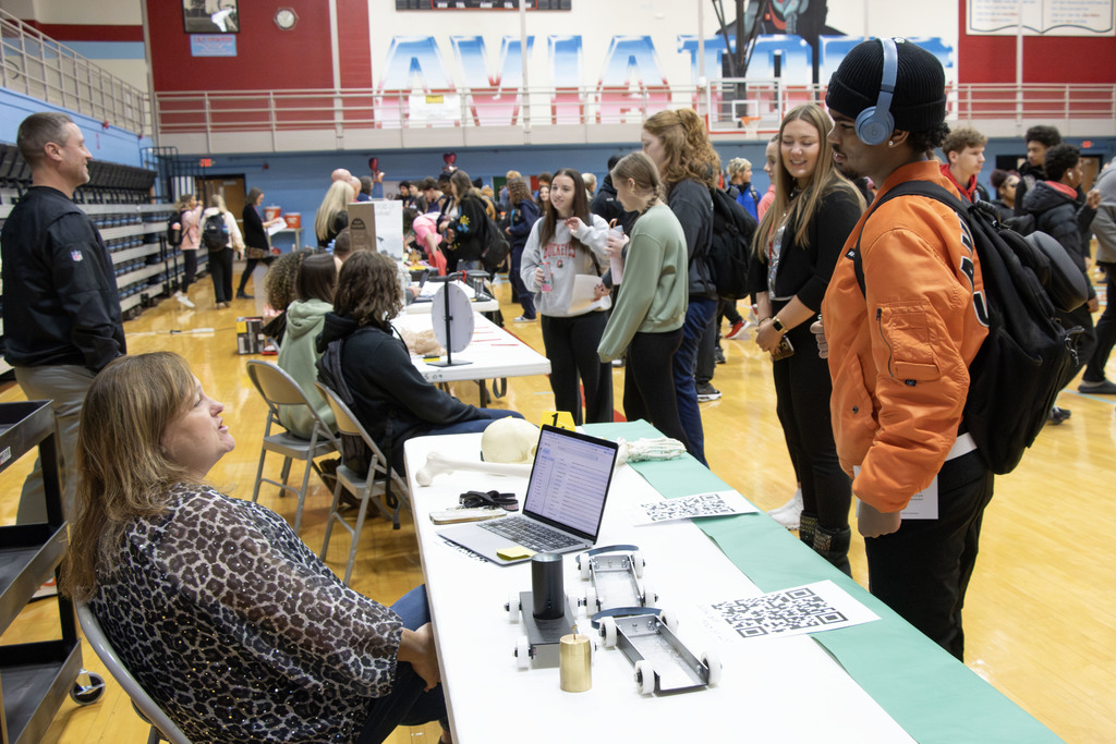 Students talking at the involvement fair
