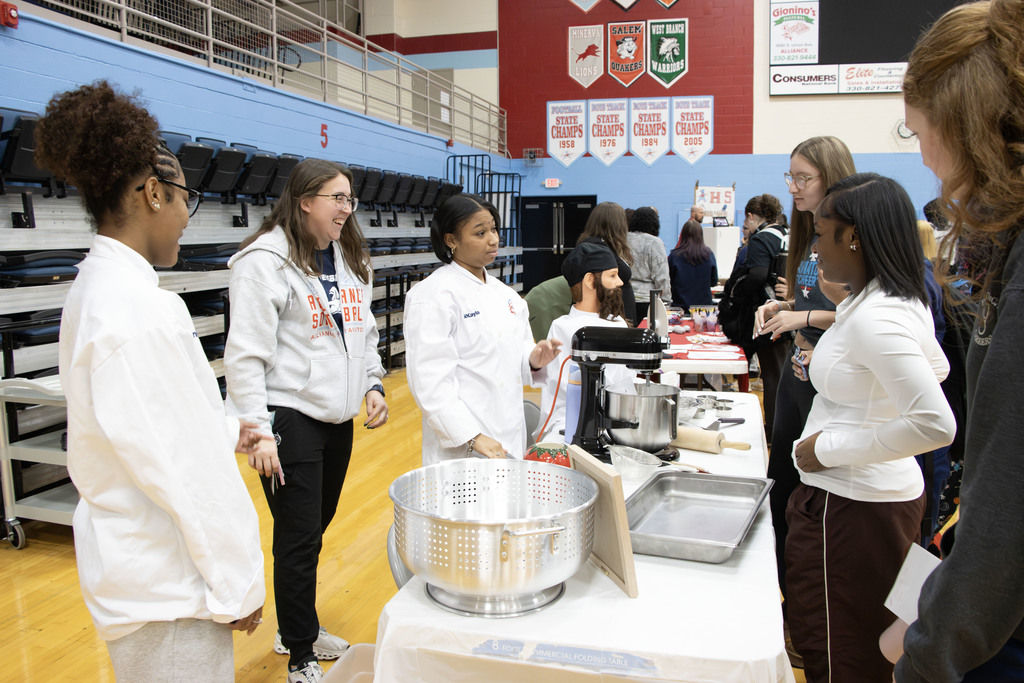 Students talking at the involvement fair