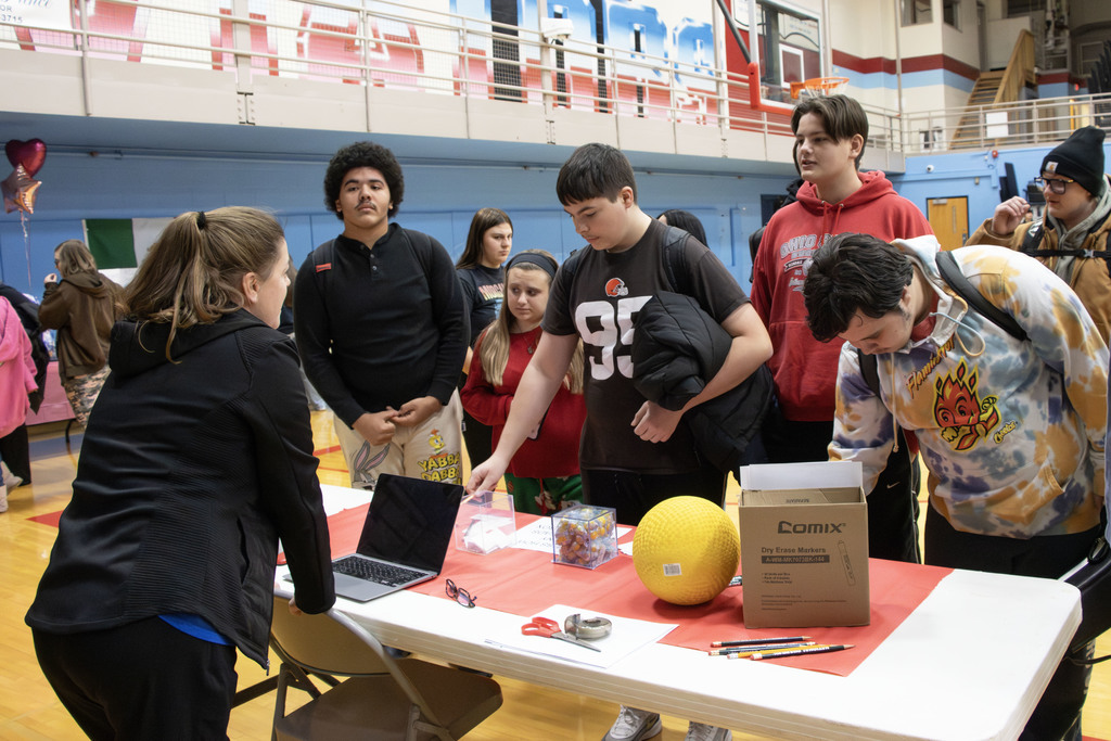Students talking at the involvement fair