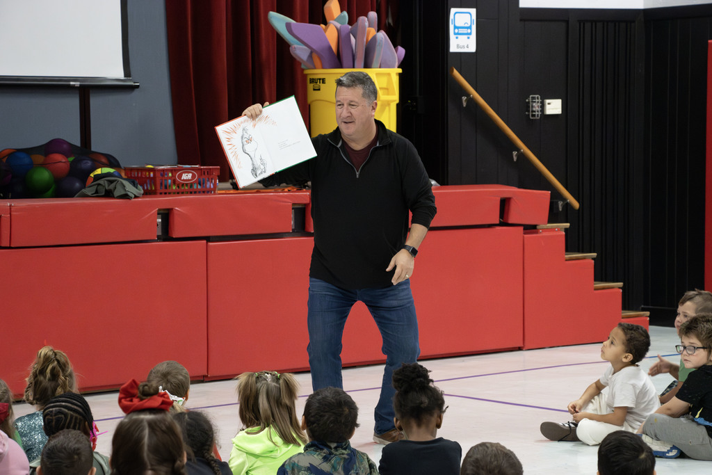 Kevin Kern reading animatedly to the students