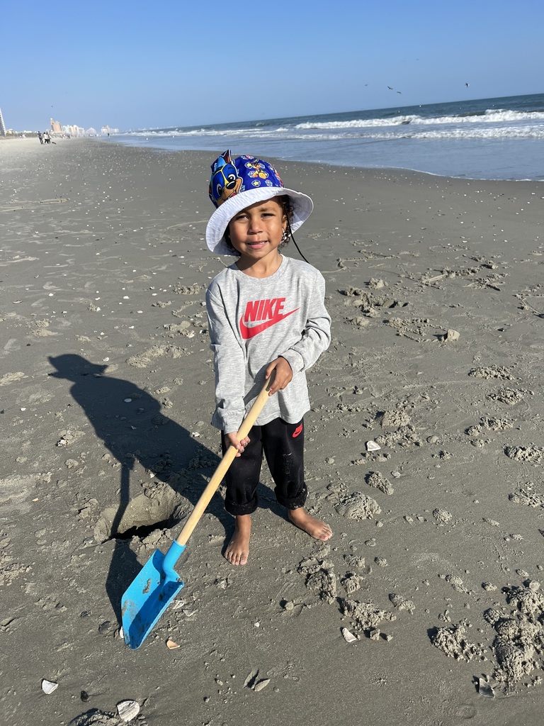 Cevyn playing on the beach