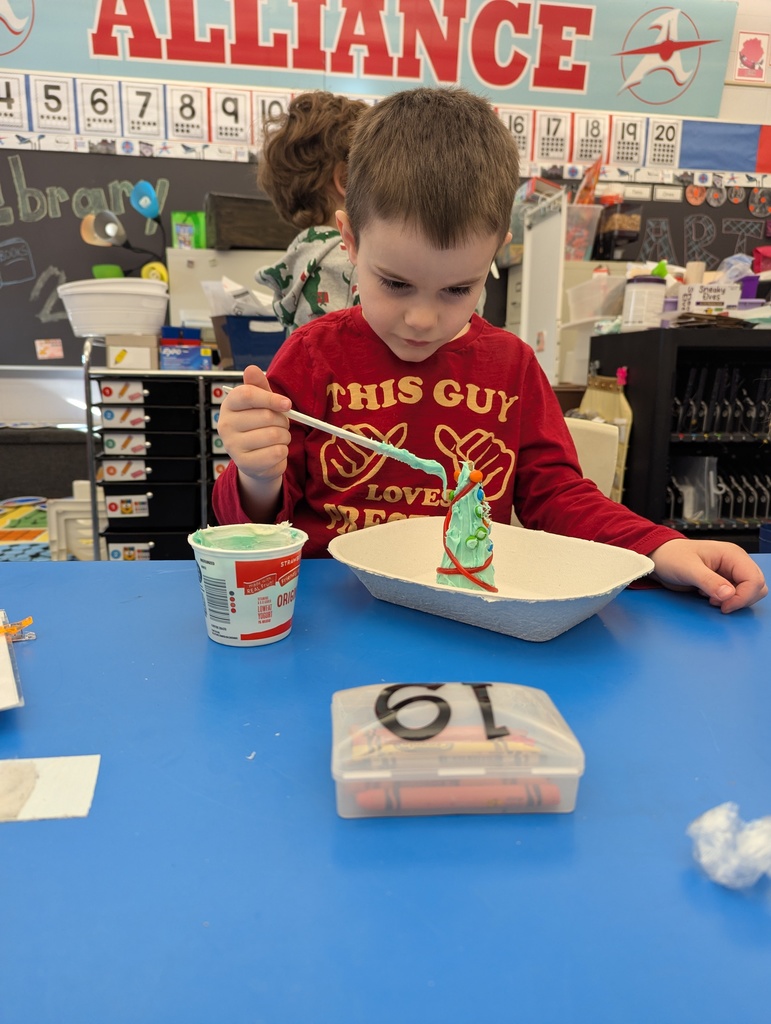 Student decorating his tree