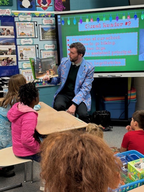 Taylor Logothetides reading