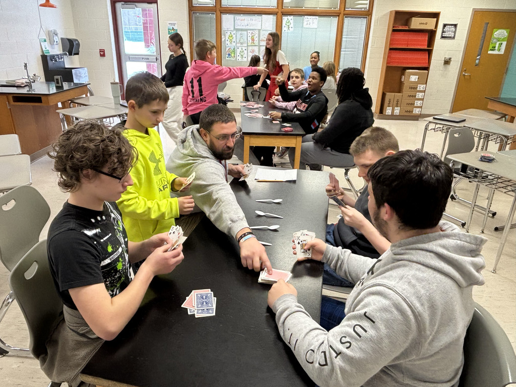 students playing card games