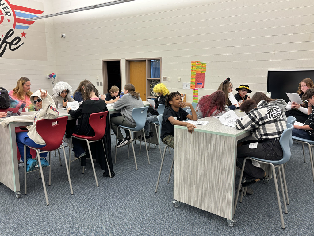 Student filling out forms for a game