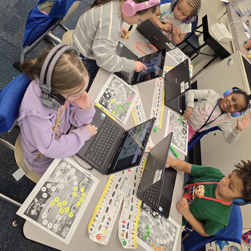 students working on their chromebooks