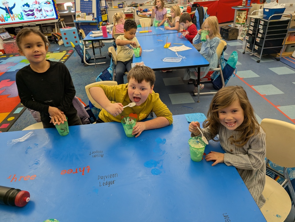 Three students eating their parfaits