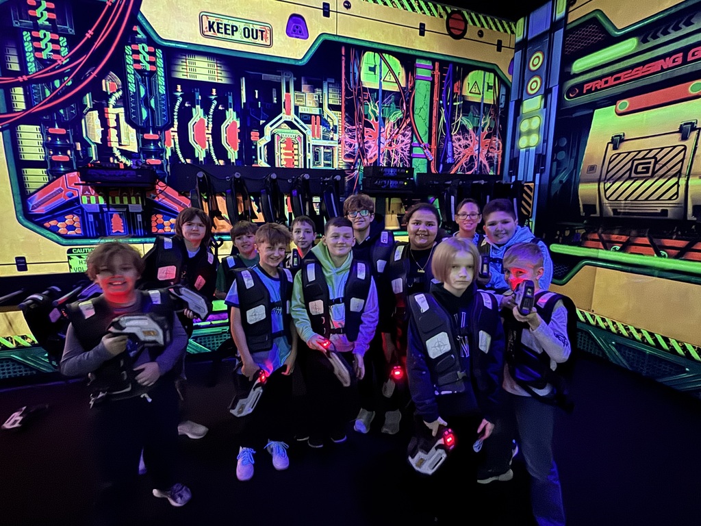 A group of students dressed and ready for laser tag