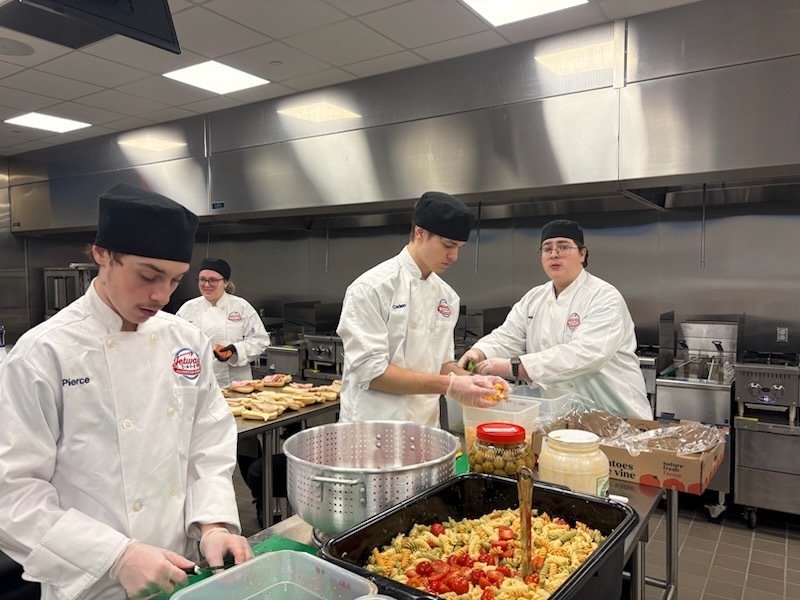 culinary students making pasta salad