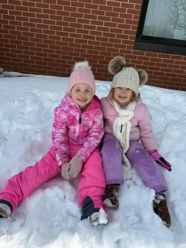 Students playing in the snow