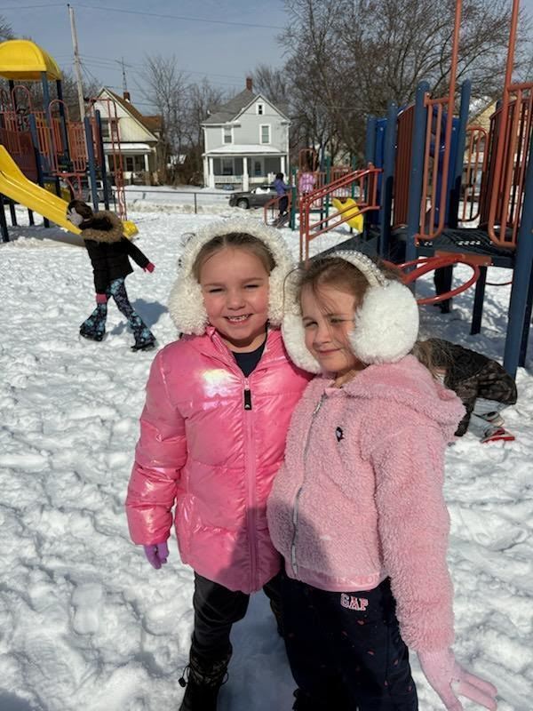 Students playing in the snow