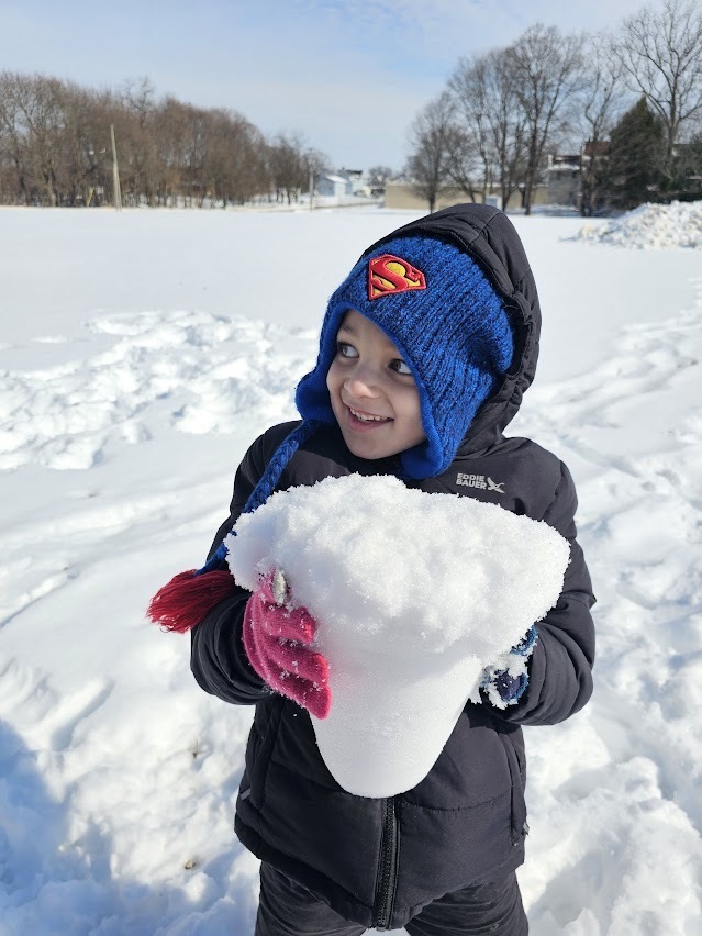 Students playing in the snow
