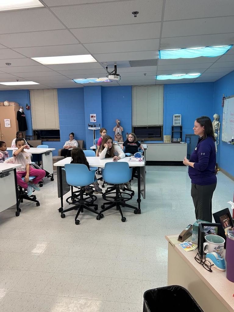 Dr. Simbro speaking to the students