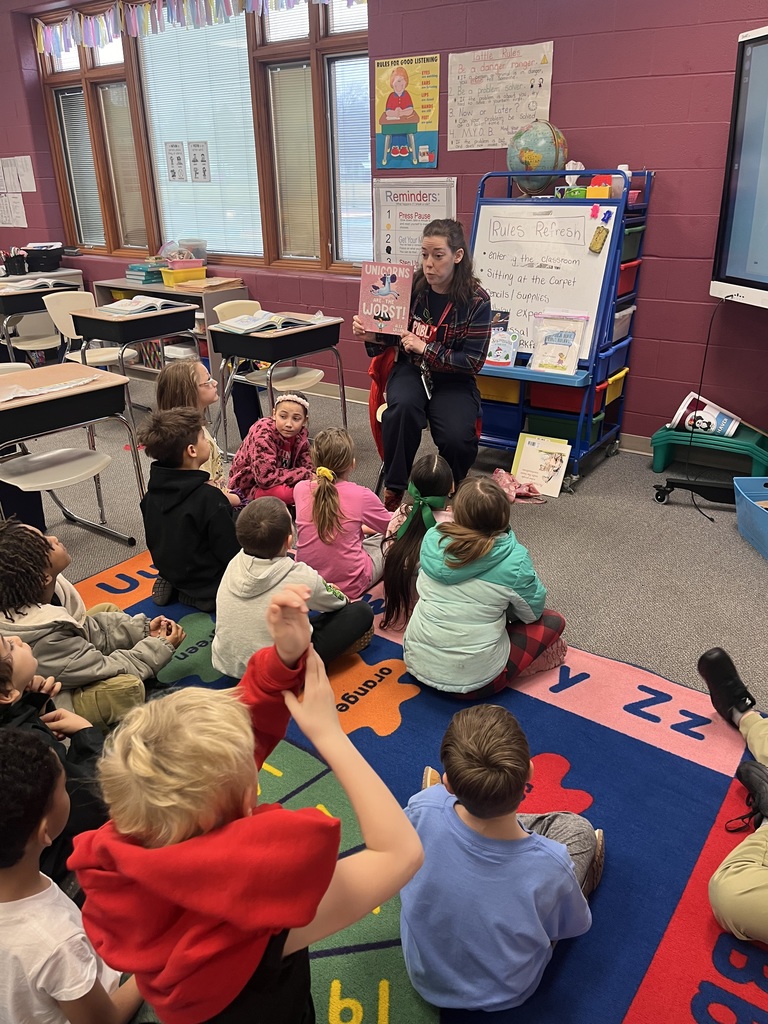 Ms. Driscoll reading to the class