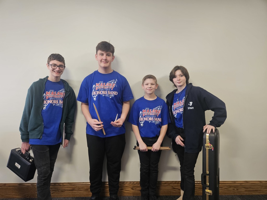 Four students standing for a group pic