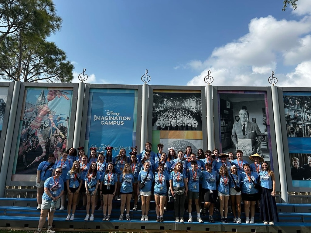 A group picture of the choir at Disney