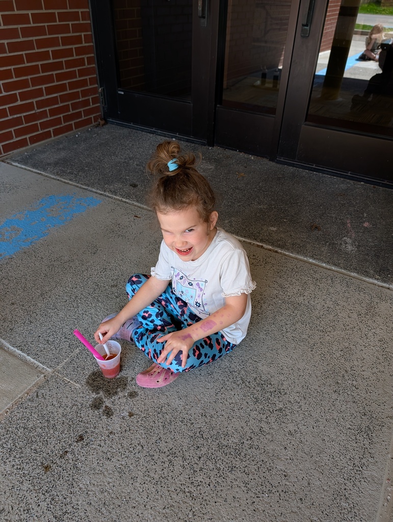 Students eating snow cones outside
